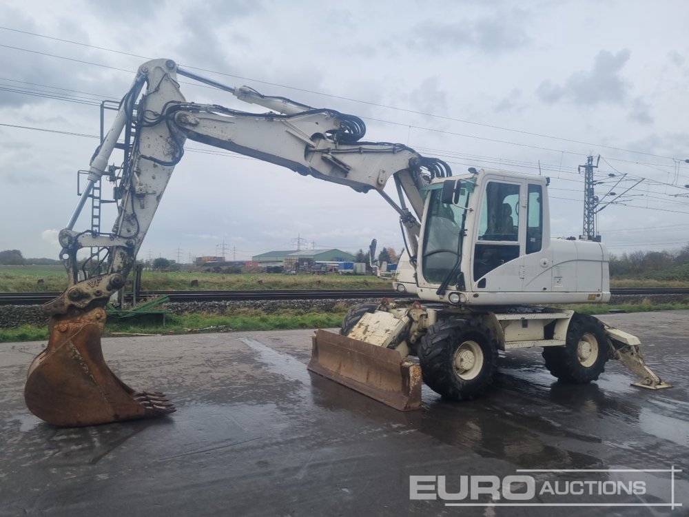 Image for WHEELED EXCAVATORS 2012 Caterpillar M313D